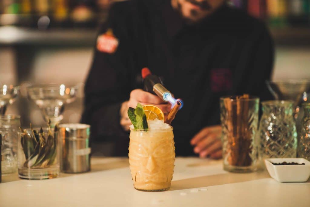 Cocktail with cinnamon from rooftop bar terraza alcazaba in malaga